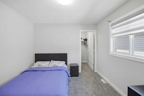 60 Redstone Grove Ne, Calgary, AB - Indoor Photo Showing Bedroom