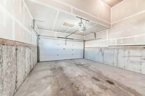 47 Amblefield Grove Nw, Calgary, AB - Indoor Photo Showing Garage