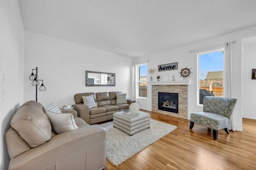 30 Cranarch View Se, Calgary, AB - Indoor Photo Showing Living Room With Fireplace