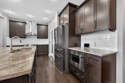 30 Evansborough View Nw, Calgary, AB - Indoor Photo Showing Kitchen With Double Sink With Upgraded Kitchen