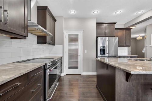 30 Evansborough View Nw, Calgary, AB - Indoor Photo Showing Kitchen With Stainless Steel Kitchen With Upgraded Kitchen