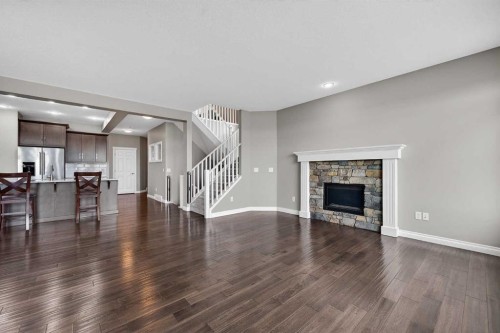 30 Evansborough View Nw, Calgary, AB - Indoor Photo Showing Living Room With Fireplace