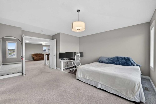 30 Evansborough View Nw, Calgary, AB - Indoor Photo Showing Bedroom