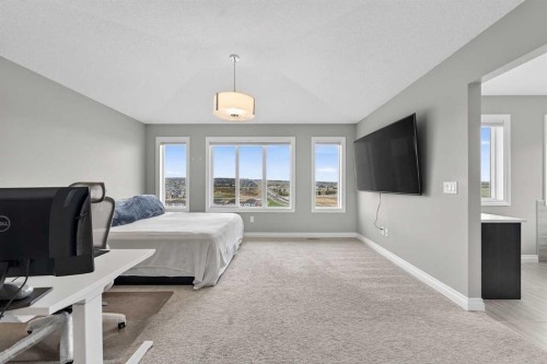 30 Evansborough View Nw, Calgary, AB - Indoor Photo Showing Bedroom