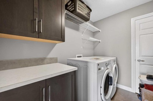 30 Evansborough View Nw, Calgary, AB - Indoor Photo Showing Laundry Room