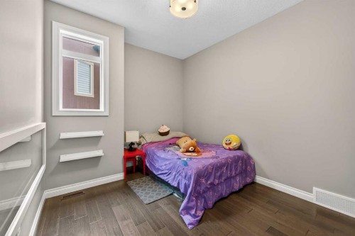 30 Evansborough View Nw, Calgary, AB - Indoor Photo Showing Bedroom