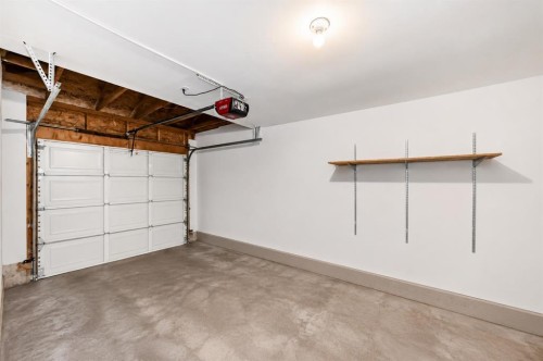 152 Country Hills Villas Nw, Calgary, AB - Indoor Photo Showing Garage