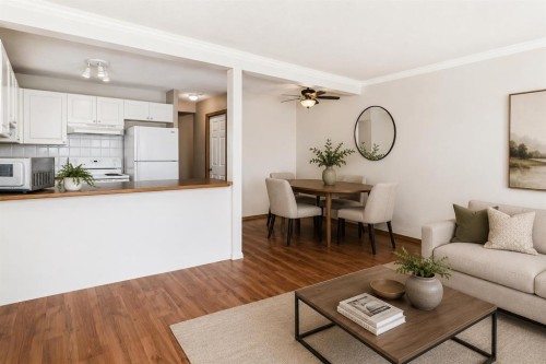 152 Country Hills Villas Nw, Calgary, AB - Indoor Photo Showing Living Room