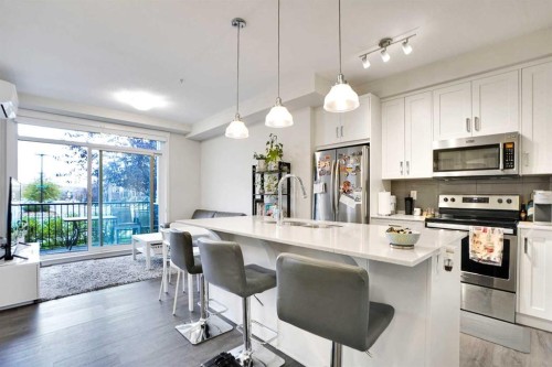 111-30 Walgrove Walk Se, Calgary, AB - Indoor Photo Showing Kitchen With Stainless Steel Kitchen With Upgraded Kitchen