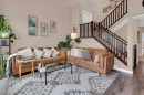 17-28 Heritage Drive, Cochrane, AB  - Indoor Photo Showing Living Room 