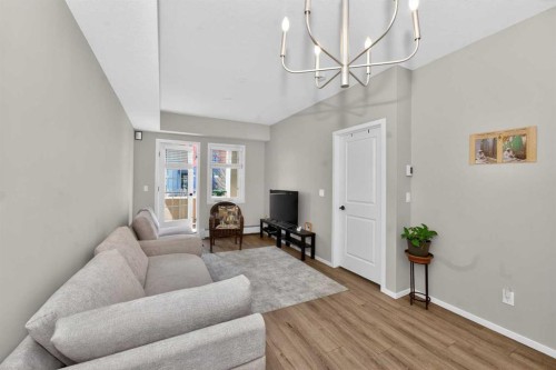 218-140 Mahogany Street Se, Calgary, AB - Indoor Photo Showing Living Room