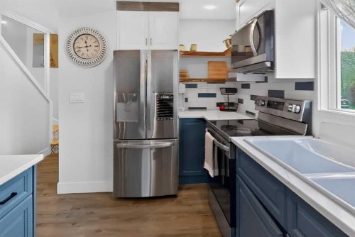 7704 23 Avenue, Coleman, AB - Indoor Photo Showing Kitchen With Stainless Steel Kitchen