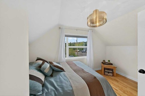 7704 23 Avenue, Coleman, AB - Indoor Photo Showing Bedroom