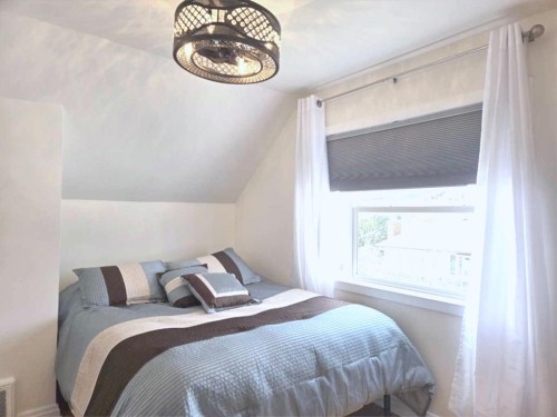 7704 23 Avenue, Coleman, AB - Indoor Photo Showing Bedroom