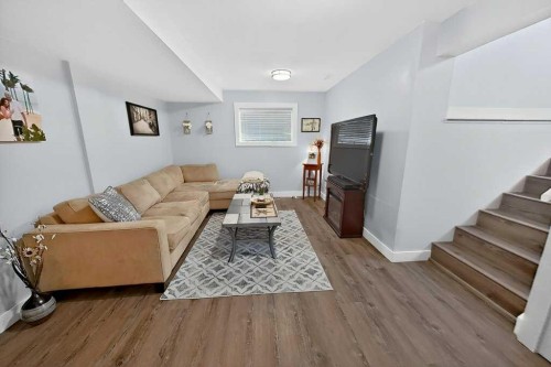 7704 23 Avenue, Coleman, AB - Indoor Photo Showing Living Room