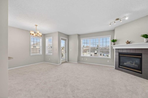 3106-7171 Coach Hill Road Sw, Calgary, AB - Indoor Photo Showing Other Room With Fireplace