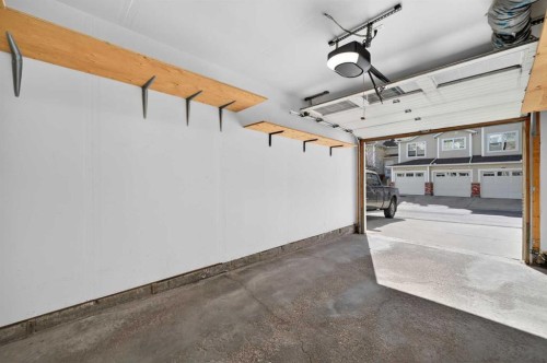 3106-7171 Coach Hill Road Sw, Calgary, AB - Indoor Photo Showing Garage