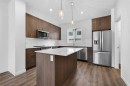 56 Creekside Drive Sw, Calgary, AB  - Indoor Photo Showing Kitchen With Stainless Steel Kitchen With Upgraded Kitchen 