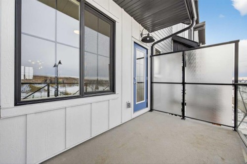 56 Creekside Drive Sw, Calgary, AB -  With Balcony With Exterior