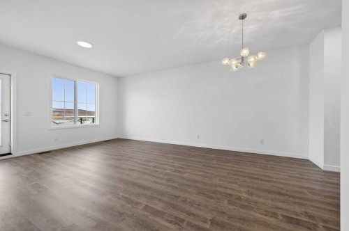 56 Creekside Drive Sw, Calgary, AB - Indoor Photo Showing Other Room