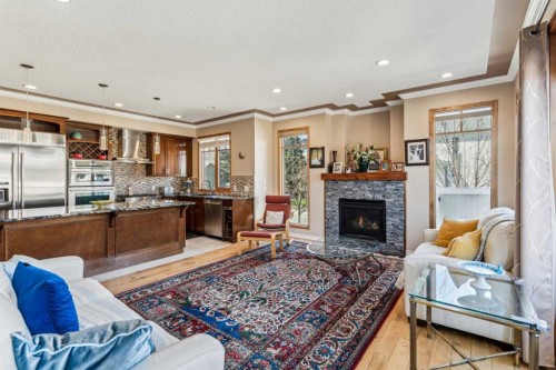 4538 Montgomery Avenue Nw, Calgary, AB - Indoor Photo Showing Other Room With Fireplace