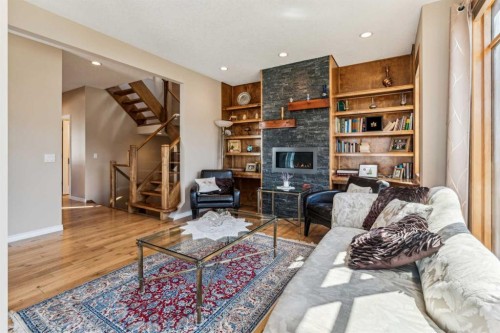 4538 Montgomery Avenue Nw, Calgary, AB - Indoor Photo Showing Living Room With Fireplace