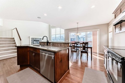 455 Hidden Creek Boulevard Nw, Calgary, AB - Indoor Photo Showing Kitchen With Double Sink