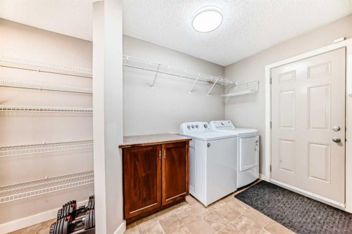 455 Hidden Creek Boulevard Nw, Calgary, AB - Indoor Photo Showing Laundry Room