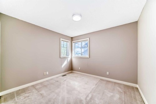 455 Hidden Creek Boulevard Nw, Calgary, AB - Indoor Photo Showing Other Room