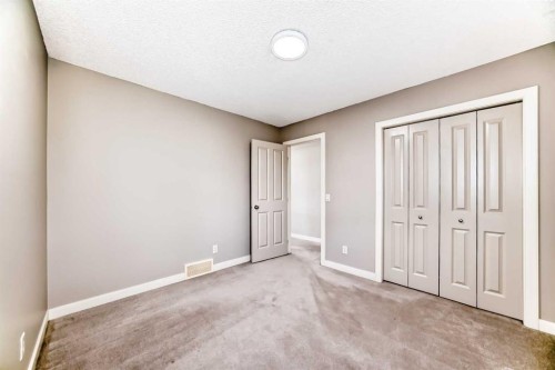455 Hidden Creek Boulevard Nw, Calgary, AB - Indoor Photo Showing Other Room