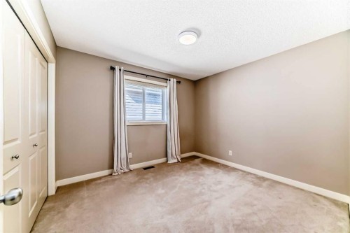 455 Hidden Creek Boulevard Nw, Calgary, AB - Indoor Photo Showing Other Room