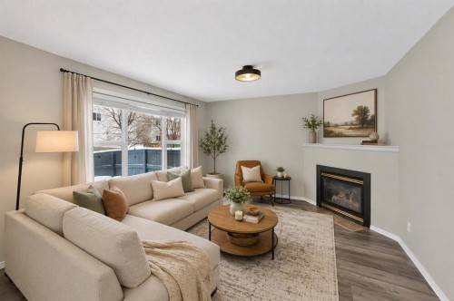 42 Royal Elm Drive Nw, Calgary, AB - Indoor Photo Showing Living Room With Fireplace