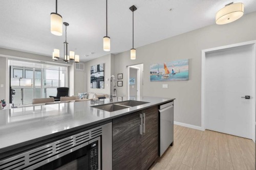 504-122 Mahogany Centre Se, Calgary, AB - Indoor Photo Showing Kitchen With Double Sink