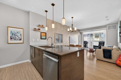 504-122 Mahogany Centre Se, Calgary, AB - Indoor Photo Showing Kitchen With Double Sink With Upgraded Kitchen