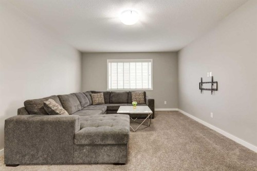165 Bayside Loop Sw, Airdrie, AB - Indoor Photo Showing Living Room