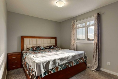 165 Bayside Loop Sw, Airdrie, AB - Indoor Photo Showing Bedroom