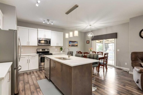 165 Bayside Loop Sw, Airdrie, AB - Indoor Photo Showing Kitchen With Double Sink