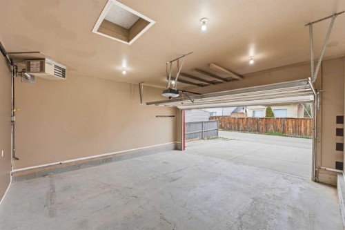 203 West Creek Close, Chestermere, AB - Indoor Photo Showing Garage