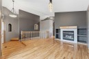 203 West Creek Close, Chestermere, AB  - Indoor With Fireplace 