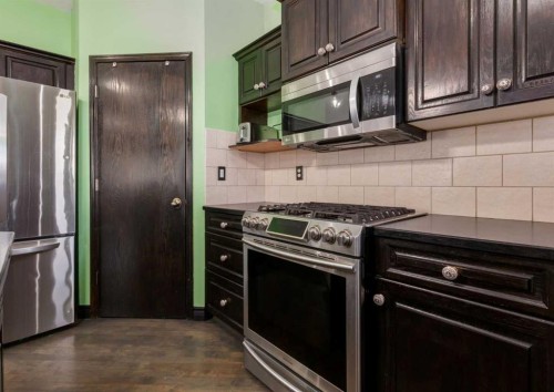 244 Stonegate Close Nw, Airdrie, AB - Indoor Photo Showing Kitchen