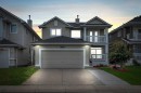 51 Coral Reef Close Ne, Calgary, AB  - Outdoor With Balcony With Facade 