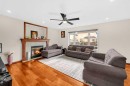 51 Coral Reef Close Ne, Calgary, AB  - Indoor Photo Showing Living Room With Fireplace 