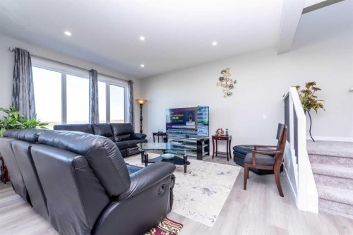 46 Savoy Landing Se, Calgary, AB - Indoor Photo Showing Living Room