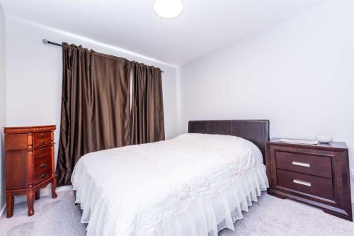 46 Savoy Landing Se, Calgary, AB - Indoor Photo Showing Bedroom