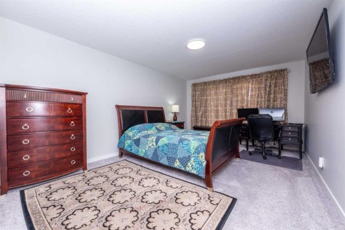 46 Savoy Landing Se, Calgary, AB - Indoor Photo Showing Bedroom