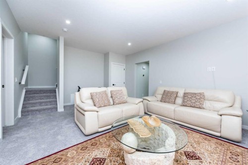 46 Savoy Landing Se, Calgary, AB - Indoor Photo Showing Living Room