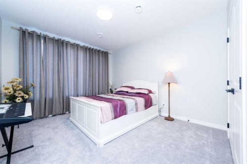 46 Savoy Landing Se, Calgary, AB - Indoor Photo Showing Bedroom