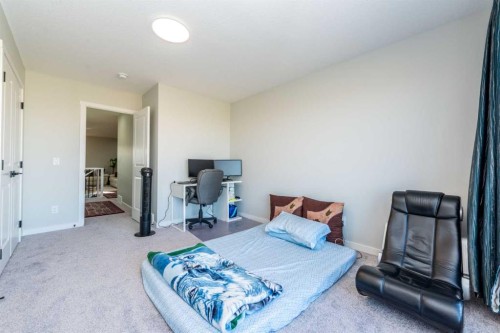 46 Savoy Landing Se, Calgary, AB - Indoor Photo Showing Bedroom