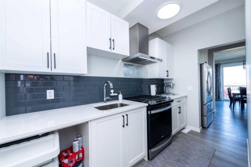 46 Savoy Landing Se, Calgary, AB - Indoor Photo Showing Kitchen