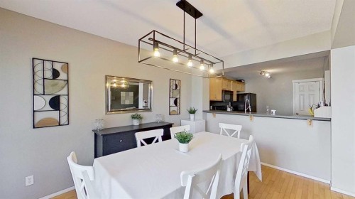 17 Sunset Heights, Cochrane, AB - Indoor Photo Showing Dining Room